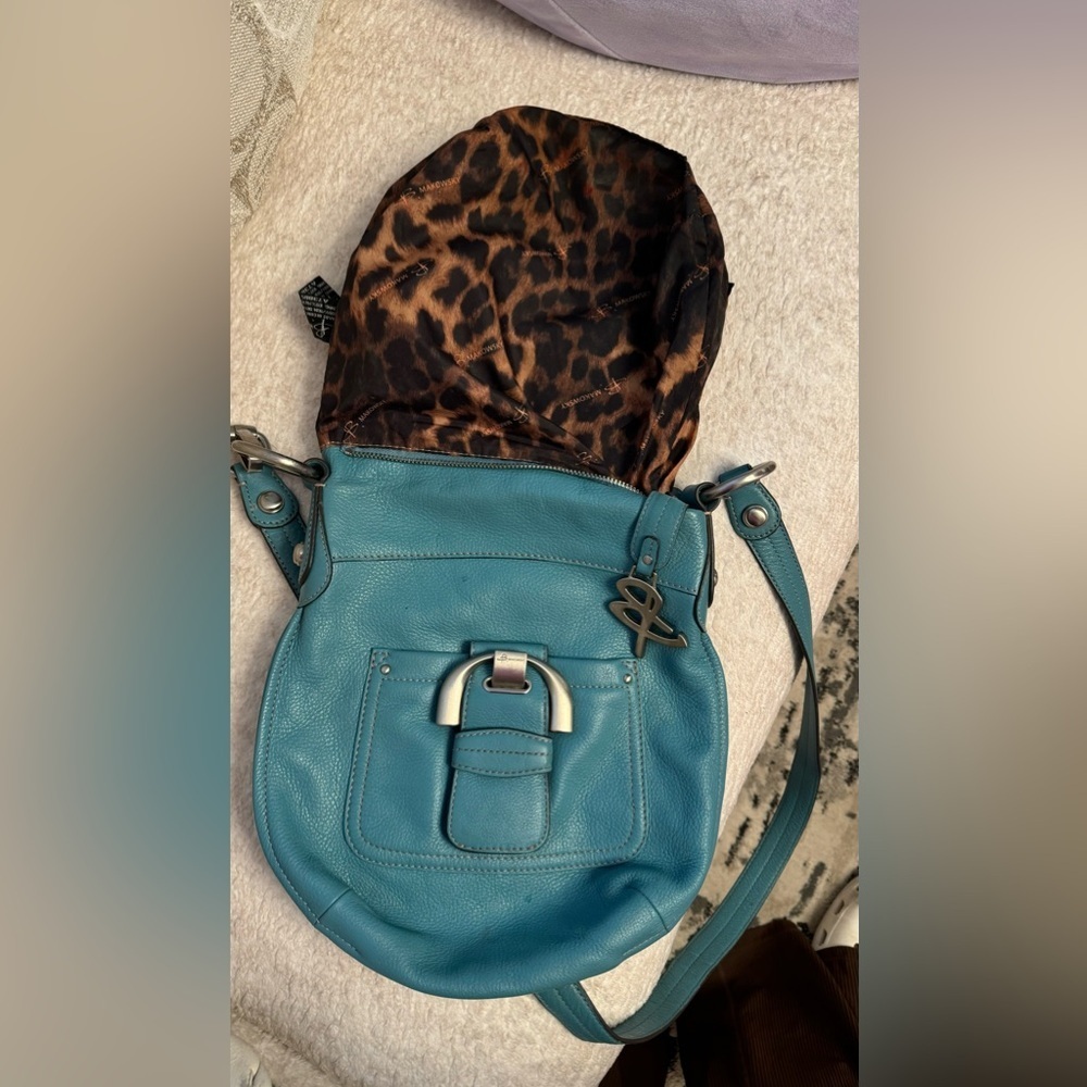 Stylish Blue Shoulder Bag
B. Makowsky Turquoise Leather Crossbody Bag